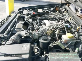 ✅ 1999 Infiniti QX4 • VIN: JNRAR05Y3XW047670 • Lot: 43757053. Listed on IAAI with 142,059 mi. Free auction sales archive from the USA and detailed vehicle history report at DreamBid. Image 12.