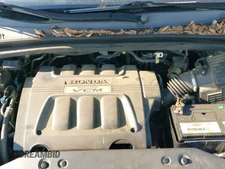 ✅ 2008 Honda Odyssey EX-L • VIN: 5FNRL387X8B082821 • Lot: 43151313. Wystawiony na IAAI z przebiegiem 295 797 mil. Bezpłatny archiwum sprzedaży aukcyjnych z USA i szczegółowy raport historii pojazdu na DreamBid. Zdjęcie 12.