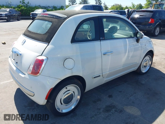 ✅ 2015 FIAT 500 Lounge • VIN: 3C3CFFER9FT716644 • Lot: 42059173. Wystawiony na IAAI z przebiegiem 69 982 mil. Bezpłatny archiwum sprzedaży aukcyjnych z USA i szczegółowy raport historii pojazdu na DreamBid. Zdjęcie 4.