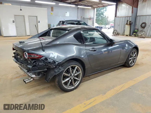 ✅ 2023 Mazda MX-5 Miata Grand Touring • VIN: JM1NDAM71P0561583 • Лот: 85557305. Опубліковано раніше на Copart з пробігом 17 147 миль. Безкоштовний доступ до архіву аукціонних продажів зі США та докладний звіт про історію автомобіля на DreamBid. Зображення 3.