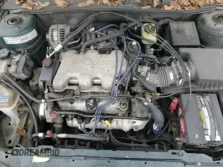 1999 Chevrolet Malibu LS z VIN 1G1NE52M1X6237777, wystawiony jako Copart lot #83672864 z przebiegiem 239 916 mil mil oraz Czysty tytuł • Clean title. Historia ofert i sprzedaży dostępna na DreamBid. Obrazek 13.