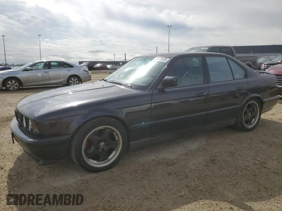 ✅ 1989 BMW M5 • VIN: WBSHD91030BK01303 • Lot: 69876935. Wystawiony na Copart z przebiegiem 318 263 mil. Bezpłatny archiwum sprzedaży aukcyjnych z USA i szczegółowy raport historii pojazdu na DreamBid. Zdjęcie 1.