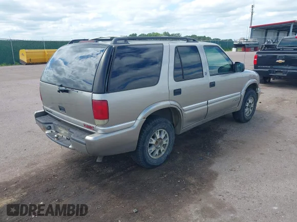 ✅ 2001 GMC Jimmy SLT • VIN: 1GKDT13W512139808 • Lot: 42766086. Listed on IAAI with 206,775 mi. Free auction sales archive from the USA and detailed vehicle history report at DreamBid. Image 4.