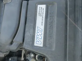 ✅ 2012 Honda Civic • VIN: JHMFB4F30CS007969 • Lot: 43179573. Listed on IAAI with 126,937 mi. Free auction sales archive from the USA and detailed vehicle history report at DreamBid. Image 12.