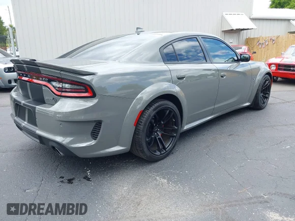 ✅ 2023 Dodge Charger SRT Hellcat Redeye Widebody • VIN: 2C3CDXL93PH557984 • Lot: 45117805. Wystawiony na IAAI z przebiegiem 9 976 mil. Bezpłatny archiwum sprzedaży aukcyjnych z USA i szczegółowy raport historii pojazdu na DreamBid. Zdjęcie 4.
