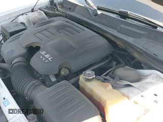 ✅ 2012 Dodge Challenger SXT • VIN: 2C3CDYAG5CH315201 • Lot: 42966307. Wystawiony na IAAI z przebiegiem 107 154 mil. Bezpłatny archiwum sprzedaży aukcyjnych z USA i szczegółowy raport historii pojazdu na DreamBid. Zdjęcie 23.