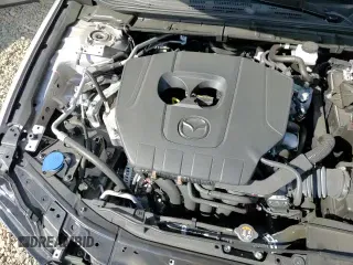 ✅ 2023 Mazda 3 S Carbon Edition • VIN: 3MZBPACM8PM371968 • Лот: 71831945. Опубликован ранее на Copart с пробегом 11 073 миль. Бесплатный доступ к архиву аукционных продаж из США и подробный отчёт об истории автомобиля на DreamBid. Изображение 14.