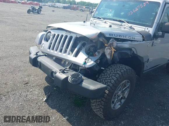 ✅ 2015 Jeep Wrangler Unlimited Rubicon Hard Rock • VIN: 1C4HJWFG8FL629181 • Lot: 42627589. Wystawiony na IAAI z przebiegiem 106 574 mil. Bezpłatny archiwum sprzedaży aukcyjnych z USA i szczegółowy raport historii pojazdu na DreamBid. Zdjęcie 6.