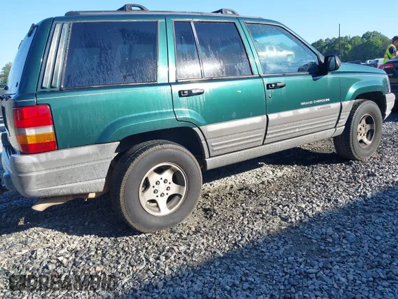 ✅ 1998 Jeep Grand Cherokee Laredo • VIN: 1J4FX58S9WC124908 • Лот: 45152632. Опубліковано раніше на IAAI з пробігом 246 182 миль. Безкоштовний доступ до архіву аукціонних продажів зі США та докладний звіт про історію автомобіля на DreamBid. Зображення 4.