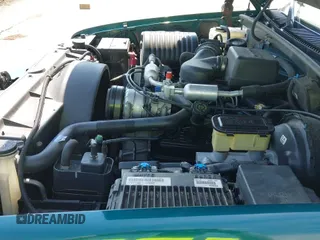 ✅ 1999 GMC Suburban • VIN: 1GKFK16R1XJ784536 • Lot: 42877193. Listed on IAAI with 89,308 mi. Free auction sales archive from the USA and detailed vehicle history report at DreamBid. Image 13.