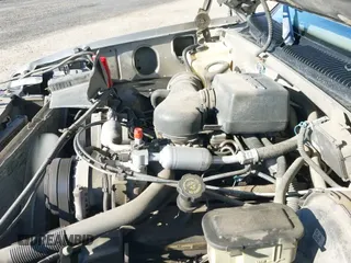 1999 Chevrolet Suburban with VIN 1GNFK16R9XJ318663, listed as a IAAI auction lot 43358644 with 197,845 mi miles and . Bid and sale history available at DreamBid. Image 22.