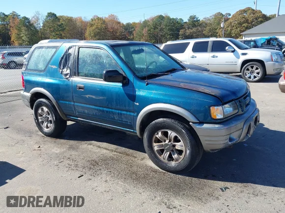✅ 2001 Isuzu Rodeo • VIN: 4S2CK57W614333946 • Lot: 43694083. Wystawiony na IAAI z przebiegiem 256 189 mil. Bezpłatny archiwum sprzedaży aukcyjnych z USA i szczegółowy raport historii pojazdu na DreamBid. Zdjęcie 1.