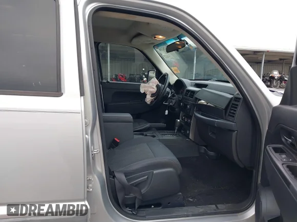 ✅ 2011 Jeep Liberty Sport Jet • VIN: 1J4PP2GK6BW536880 • Lot: 41428398. Listed on IAAI with 117,376 mi. Free auction sales archive from the USA and detailed vehicle history report at DreamBid. Image 5.