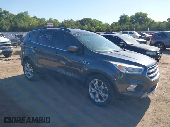 ✅ 2017 Ford Escape SE • VIN: 1FMCU9GD8HUE31667 • Lot: 45277474. Wystawiony na IAAI z przebiegiem 163 126 mil. Bezpłatny archiwum sprzedaży aukcyjnych z USA i szczegółowy raport historii pojazdu na DreamBid. Zdjęcie 1.