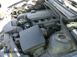 ✅ 2005 BMW 3 Series 330Ci • VIN: WBABW53455PL48472 • Lot: 42137232. Listed on IAAI with 127,689 mi. Free auction sales archive from the USA and detailed vehicle history report at DreamBid. Image 16.