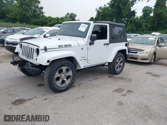 ✅ 2018 Jeep Wrangler Sahara • VIN: 1C4AJWBG1JL809098 • Lot: 42875034. Wystawiony na IAAI z przebiegiem 24 297 mil. Bezpłatny archiwum sprzedaży aukcyjnych z USA i szczegółowy raport historii pojazdu na DreamBid. Zdjęcie 18.