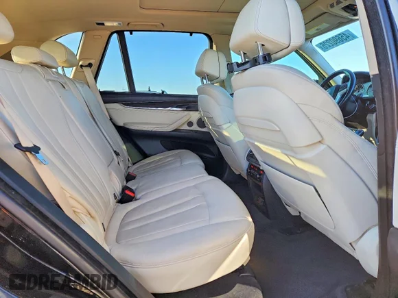 ✅ 2015 BMW X5 xDrive50i • VIN: 5UXKR6C57F0J76933 • Lot: 45690226. Listed on Copart with 124,372 mi. Free auction sales archive from the USA and detailed vehicle history report at DreamBid. Image 11.
