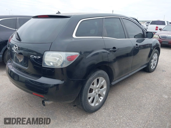 ✅ 2007 Mazda CX-7 Grand Touring • VIN: JM3ER29L570135576 • Лот: 41353042. Опубліковано раніше на IAAI з пробігом 170 991 миль. Безкоштовний доступ до архіву аукціонних продажів зі США та докладний звіт про історію автомобіля на DreamBid. Зображення 4.
