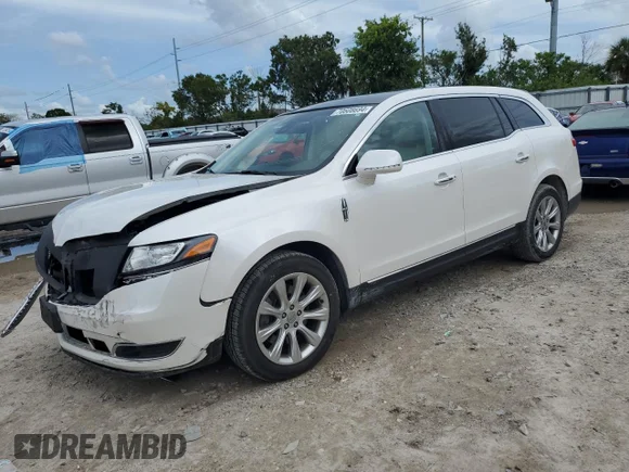 ✅ 2014 Lincoln MKT • VIN: 2LMHJ5FK5EBL57377 • Lot: 70608694. Listed on Copart with 115,053 mi. Free auction sales archive from the USA and detailed vehicle history report at DreamBid. Image 1.