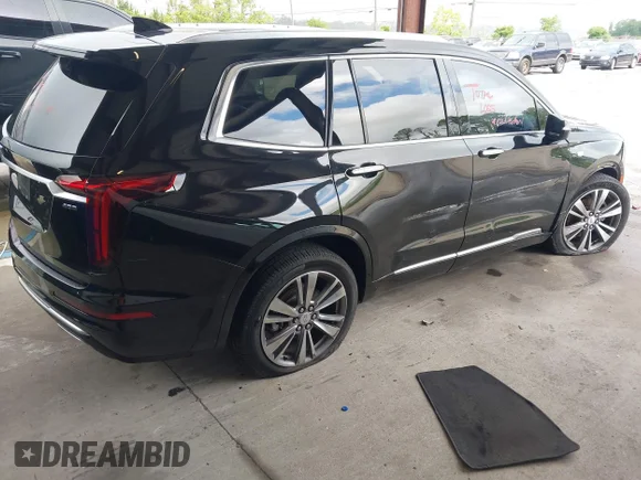 ✅ 2020 Cadillac XT6 FWD Premium Luxury • VIN: 1GYKPCRS0LZ178091 • Lot: 45093789. Listed on IAAI with 121,090 mi. Free auction sales archive from the USA and detailed vehicle history report at DreamBid. Image 4.