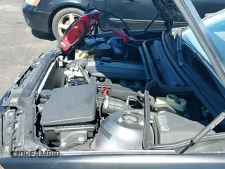 ✅ 2003 BMW 3 Series 325i • VIN: WBAET37423NJ23648 • Lot: 42632445. Listed on IAAI with 142,171 mi. Free auction sales archive from the USA and detailed vehicle history report at DreamBid. Image 12.