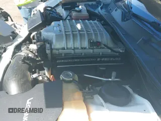 ✅ 2015 Dodge Challenger SRT Hellcat • VIN: 2C3CDZC90FH798430 • Lot: 42308448. Wystawiony na IAAI z przebiegiem 75 524 mil mil. Skorzystaj z bezpłatnego archiwum sprzedaży aukcyjnych z USA i zobacz szczegółowy raport historii pojazdu na DreamBid. Zdjęcie 20.