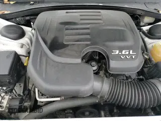 ✅ 2013 Chrysler 300 S • VIN: 2C3CCAGG1DH590552 • Lot: 83837574. Listed on Copart with 213,704 mi. Free auction sales archive from the USA and detailed vehicle history report at DreamBid. Image 16.