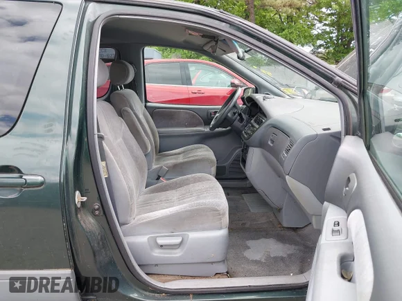 ✅ 1999 Toyota Sienna XLE • VIN: 4T3ZF13CXXU131542 • Lot: 45219680. Wystawiony na IAAI z przebiegiem 184 160 mil. Bezpłatny archiwum sprzedaży aukcyjnych z USA i szczegółowy raport historii pojazdu na DreamBid. Zdjęcie 5.