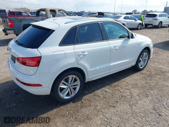 ✅ 2018 Audi Q3 Premium • VIN: WA1BCCFS8JR001155 • Лот: 41157028. Опубліковано раніше на IAAI з пробігом 83 769 миль. Безкоштовний доступ до архіву аукціонних продажів зі США та докладний звіт про історію автомобіля на DreamBid. Зображення 4.