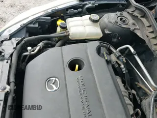 ✅ 2010 Mazda 3 i Sport • VIN: JM1BL1SG7A1199284 • Lot: 42347515. Listed on IAAI with 154,569 mi. Free auction sales archive from the USA and detailed vehicle history report at DreamBid. Image 19.