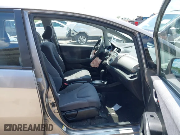 ✅ 2009 Honda Fit • VIN: JHMGE882X9S057584 • Lot: 44893884. Listed on IAAI with 111,804 mi. Free auction sales archive from the USA and detailed vehicle history report at DreamBid. Image 5.