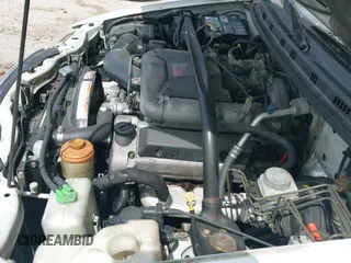 ✅ 2003 Suzuki XL7 Touring • VIN: JS3TX92V934104149 • Lot: 41911536. Wystawiony na IAAI z przebiegiem 140 199 mil. Bezpłatny archiwum sprzedaży aukcyjnych z USA i szczegółowy raport historii pojazdu na DreamBid. Zdjęcie 12.