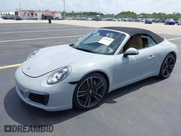 ✅ 2019 Porsche 911 Carrera • VIN: WP0CA2A98KS129145 • Лот: 42500489. Опубліковано раніше на IAAI з пробігом 19 496 миль. Безкоштовний доступ до архіву аукціонних продажів зі США та докладний звіт про історію автомобіля на DreamBid. Зображення 2.