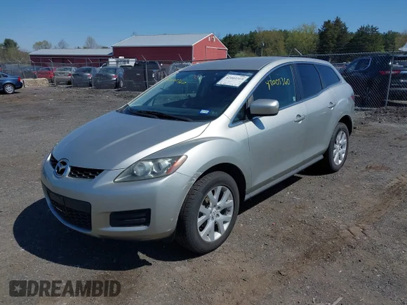 ✅ 2009 Mazda CX-7 Grand Touring • VIN: JM3ER29L990217023 • Лот: 42005360. Опубликован ранее на IAAI с пробегом 80 897 миль. Бесплатный доступ к архиву аукционных продаж из США и подробный отчёт об истории автомобиля на DreamBid. Изображение 2.