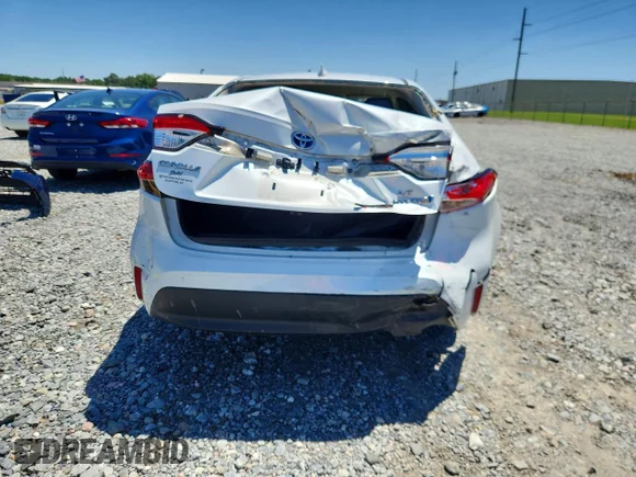 ✅ 2023 Toyota Corolla Hybrid LE • VIN: JTDBCMFE3PJ005644 • Лот: 53627486. Опубліковано раніше на Copart з пробігом 141 867 миль. Безкоштовний доступ до архіву аукціонних продажів зі США та докладний звіт про історію автомобіля на DreamBid. Зображення 6.