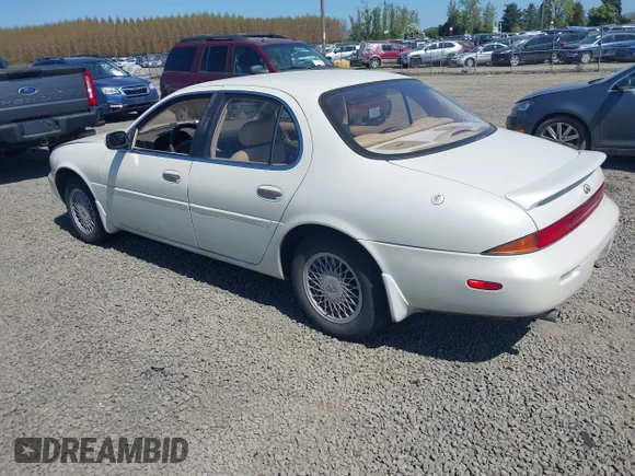 ✅ 1995 Infiniti J30 Personal Luxury • VIN: JNKAY21DXSM202705 • Lot: 42015053. Listed on IAAI with 157,452 mi. Free auction sales archive from the USA and detailed vehicle history report at DreamBid. Image 3.