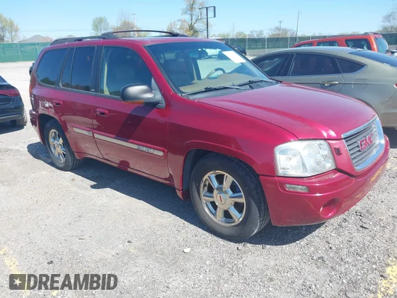 ✅ 2002 GMC Envoy SLT • VIN: 1GKDS13S922205147 • Lot: 42041118. Listed on IAAI with 127,400 mi. Free auction sales archive from the USA and detailed vehicle history report at DreamBid. Image 1.