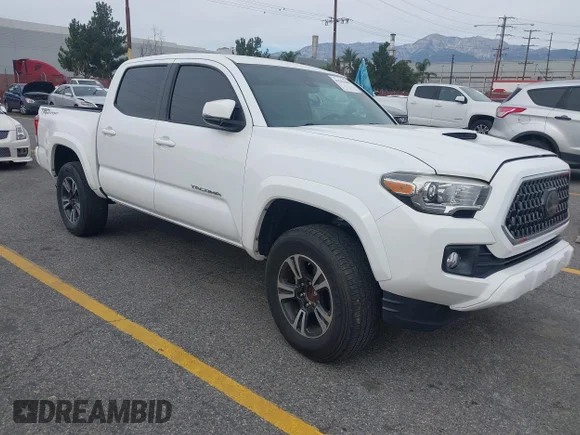 ✅ 2018 Toyota Tacoma TRD Sport • VIN: 3TMAZ5CN0JM055741 • Lot: 44181888. Listed on IAAI with 43,294 mi. Free auction sales archive from the USA and detailed vehicle history report at DreamBid. Image 1.