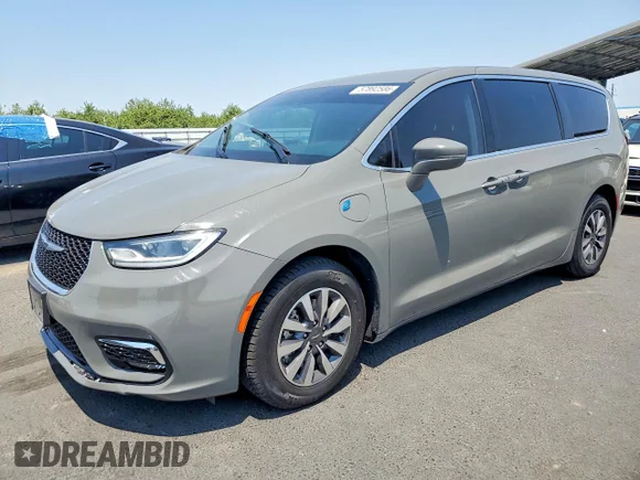 ✅ 2022 Chrysler Pacifica Hybrid Touring L • VIN: 2C4RC1L78NR129999 • Lot: 57892586. Wystawiony na Copart z przebiegiem 97 243 mil. Bezpłatny archiwum sprzedaży aukcyjnych z USA i szczegółowy raport historii pojazdu na DreamBid. Zdjęcie 1.
