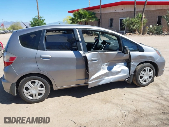 ✅ 2009 Honda Fit • VIN: JHMGE87289S050229 • Lot: 44664507. Wystawiony na IAAI z przebiegiem 174 851 mil. Bezpłatny archiwum sprzedaży aukcyjnych z USA i szczegółowy raport historii pojazdu na DreamBid. Zdjęcie 6.