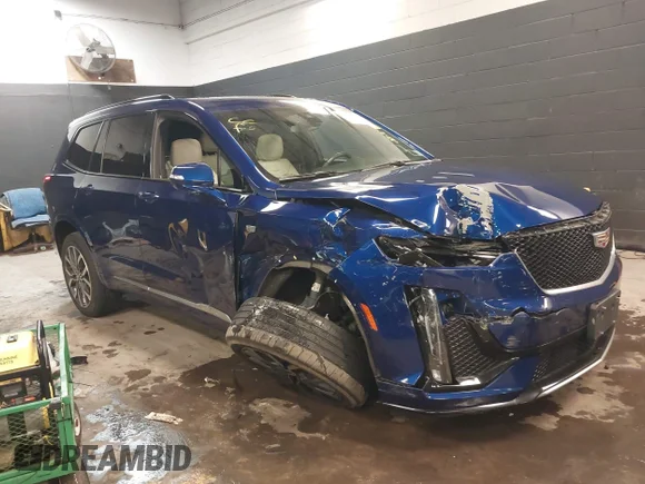 ✅ 2023 Cadillac XT6 AWD Sport • VIN: 1GYKPGRS6PZ214282 • Lot: 43979678. Listed on IAAI with 57,429 mi. Free auction sales archive from the USA and detailed vehicle history report at DreamBid. Image 1.