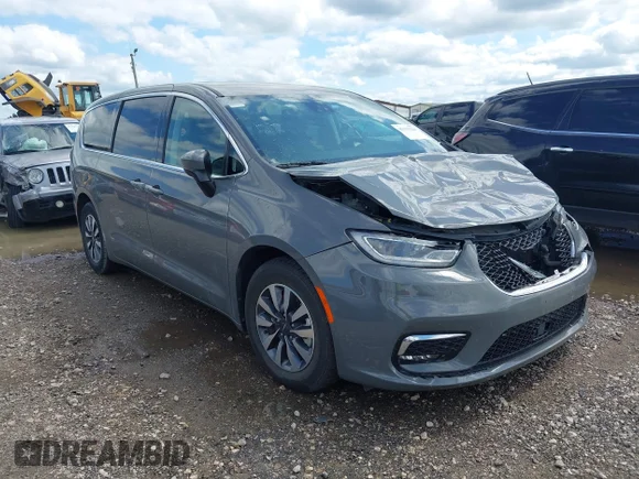 ✅ 2023 Chrysler Pacifica Hybrid Touring L • VIN: 2C4RC1L74PR588501 • Лот: 45159220. Опубліковано раніше на IAAI з пробігом 54 231 миль. Безкоштовний доступ до архіву аукціонних продажів зі США та докладний звіт про історію автомобіля на DreamBid. Зображення 1.