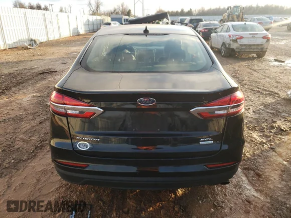 ✅ 2019 Ford Fusion SEL • VIN: 3FA6P0CD0KR109751 • Лот: 69697672. Опубликован ранее на Copart с пробегом 55 038 миль. Бесплатный доступ к архиву аукционных продаж из США и подробный отчёт об истории автомобиля на DreamBid. Изображение 6.