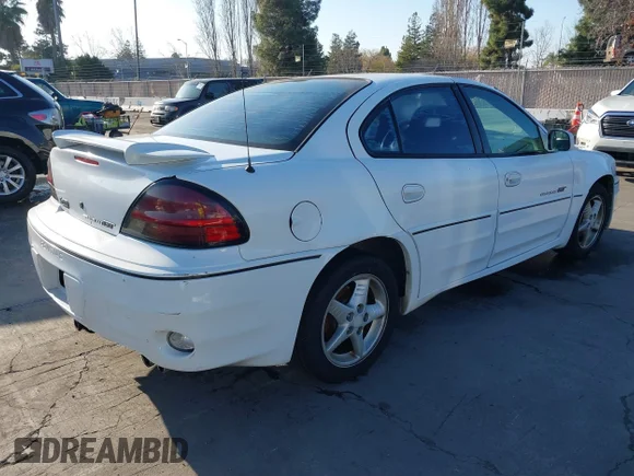 ✅ 2000 Pontiac Grand Am GT • VIN: 1G2NW52E9YM800122 • Лот: 41337074. Опубликован ранее на IAAI с пробегом 235 640 миль. Бесплатный доступ к архиву аукционных продаж из США и подробный отчёт об истории автомобиля на DreamBid. Изображение 4.
