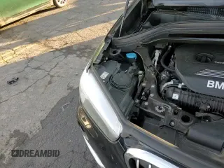 ✅ 2017 BMW X1 sDrive28i • VIN: WBXHU7C3XH5H34879 • Lot: 82401155. Listed on Copart with 101,688 mi. Free auction sales archive from the USA and detailed vehicle history report at DreamBid. Image 14.