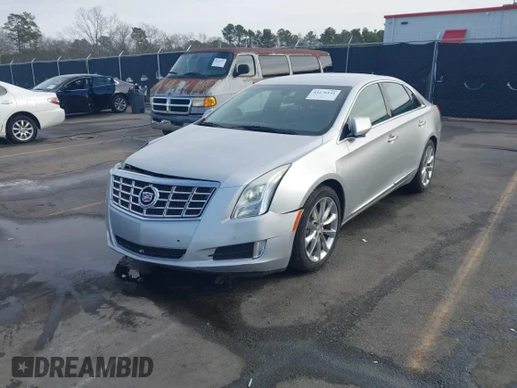 ✅ 2013 Cadillac XTS Luxury • VIN: 2G61R5S39D9219682 • Lot: 44176141. Listed on IAAI with 168,321 mi. Free auction sales archive from the USA and detailed vehicle history report at DreamBid. Image 2.