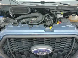 ✅ 2023 Ford Transit Cargo • VIN: 1FTBR2C8XPKA16703 • Lot: 60164215. Wystawiony na Copart z przebiegiem 75 620 mil. Bezpłatny archiwum sprzedaży aukcyjnych z USA i szczegółowy raport historii pojazdu na DreamBid. Zdjęcie 14.