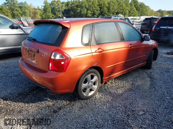 ✅ 2009 Kia Spectra Spectra5 • VIN: KNAFE241295024470 • Lot: 43186101. Listed on IAAI with 97,717 mi. Free auction sales archive from the USA and detailed vehicle history report at DreamBid. Image 4.
