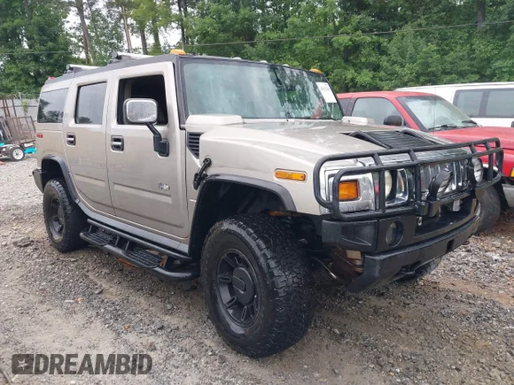 ✅ 2003 Hummer H2 • VIN: 5GRGN23U03H125580 • Lot: 45152705. Wystawiony na IAAI z przebiegiem 236 388 mil. Bezpłatny archiwum sprzedaży aukcyjnych z USA i szczegółowy raport historii pojazdu na DreamBid. Zdjęcie 1.