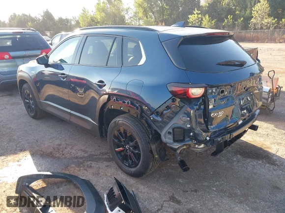 ✅ 2025 Mazda CX-50 Hybrid Premium Package • VIN: 7MMVAADW3SN132635 • Lot: 43450023. Wystawiony na IAAI z przebiegiem 6 758 mil. Bezpłatny archiwum sprzedaży aukcyjnych z USA i szczegółowy raport historii pojazdu na DreamBid. Zdjęcie 3.